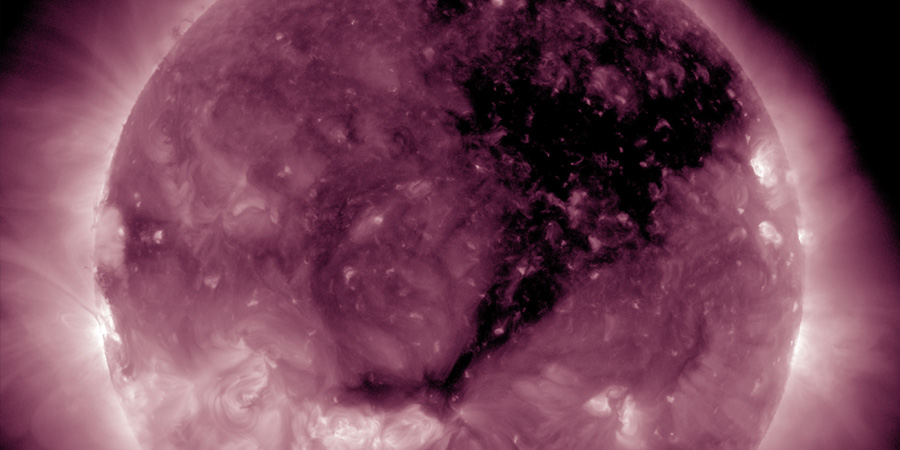 Coronal hole stream, sunspot region 2434