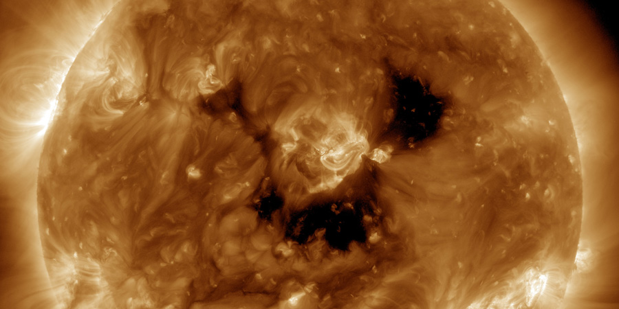 Coronal hole faces Earth, M-class solar flares