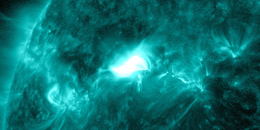 M2.1 solar flare and a partial halo CME